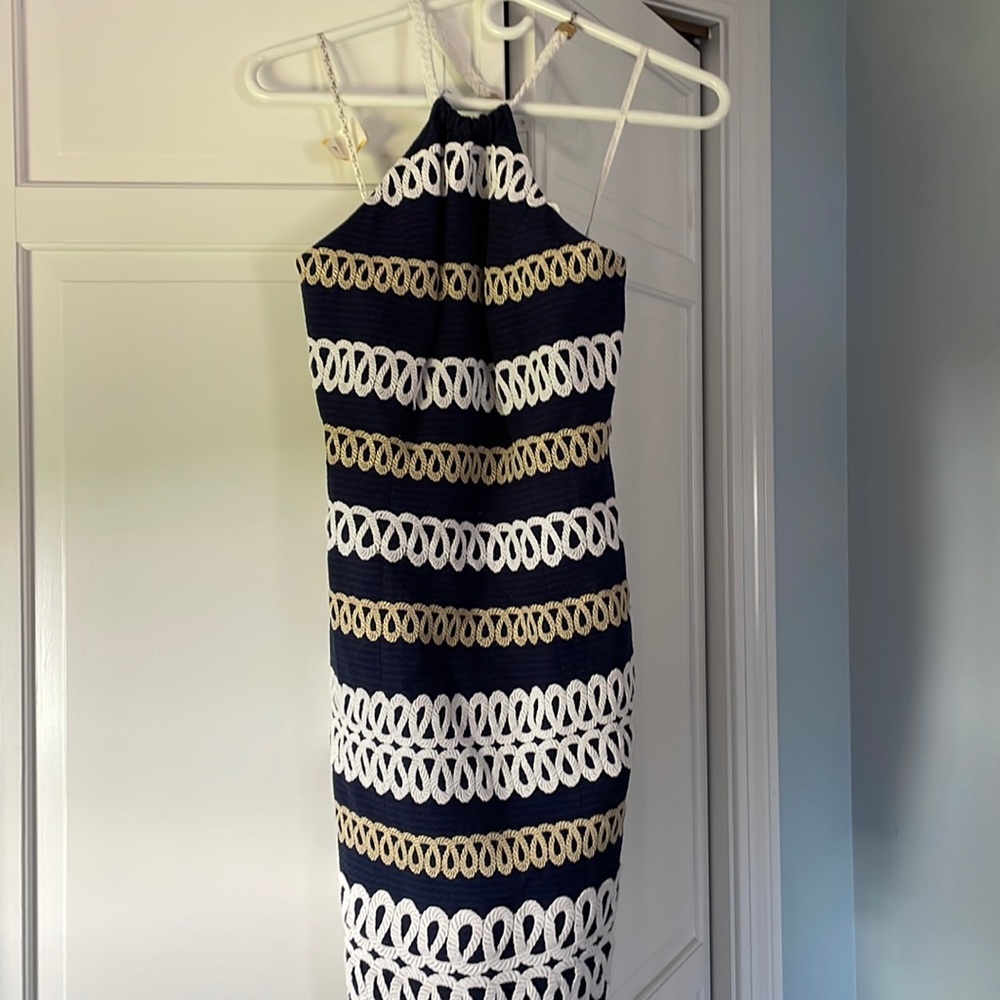 Brand new never worn Lilly Pulitzer halter dress with rope details and gold.